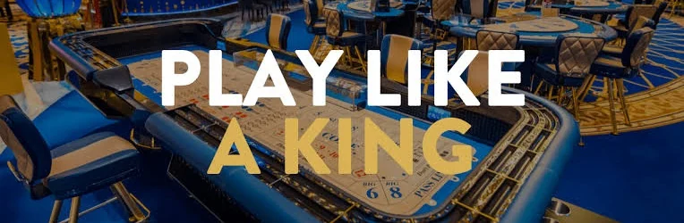 King Hills Casino &ldquo;Play Like a King&rdquo; banner over a casino table floor